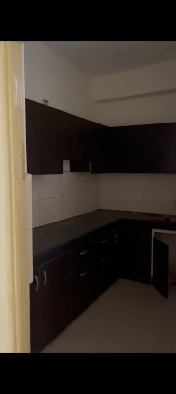 Kitchen in 2 BHK Apartment at Nitishree Aura Chimera, Raj Nagar Extension – for Rent