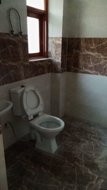 Bathroom in 2 BHK Apartment at SVP Gulmohur Garden, Raj Nagar Extension – for Rent