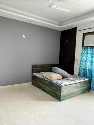Bedroom in 3 BHK Builder Floor at Freedom Fighters Enclave – for Rent