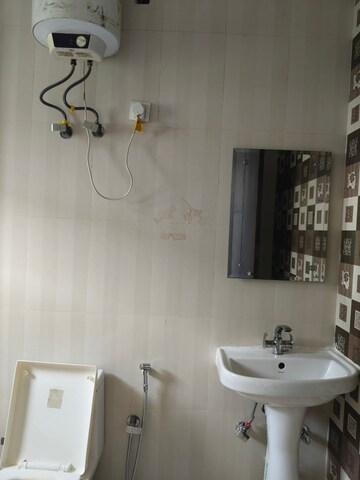 Bathroom in 3 BHK Builder Floor at Freedom Fighters Enclave – for Rent
