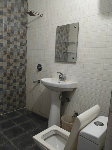 Bathroom in 3 BHK Builder Floor at Freedom Fighters Enclave – for Rent