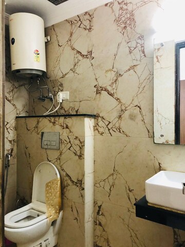 Bathroom in 3 BHK Builder Floor at Freedom Fighters Enclave – for Rent