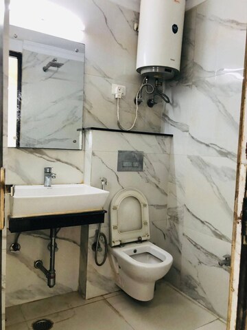 Bathroom in 3 BHK Builder Floor at Freedom Fighters Enclave – for Rent