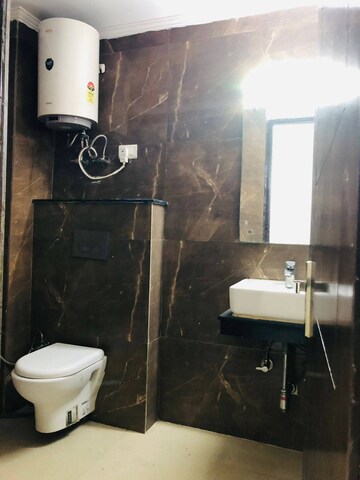 Bathroom in 3 BHK Builder Floor at Freedom Fighters Enclave – for Rent