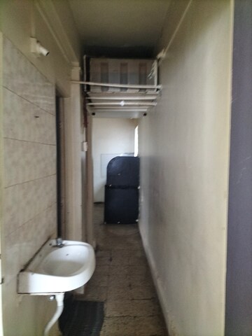 Building Lobby in 1 BHK Apartment at Pritam Apartments, Dhankawadi – for Rent