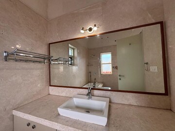 Bathroom in 4 BHK Apartment at Prestige Augusta Golf Village, Kothanur – for Rent