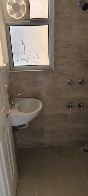 Bathroom in 1 BHK Apartment at Wave Dream Homes, Wave City – for Sale