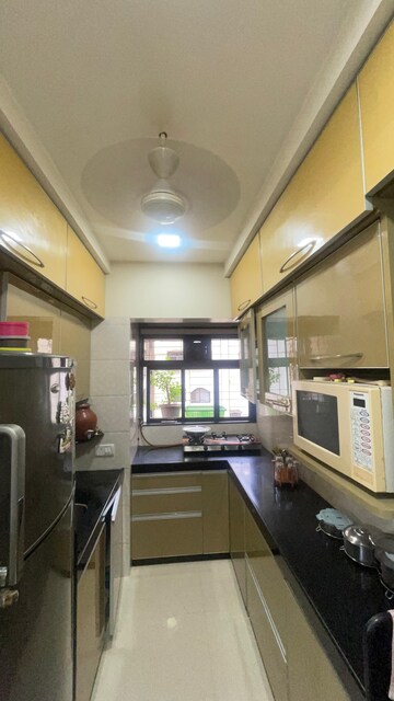 Kitchen in 1 BHK Apartment at Andheri Green Field Towers, Jogeshwari East – for Rent