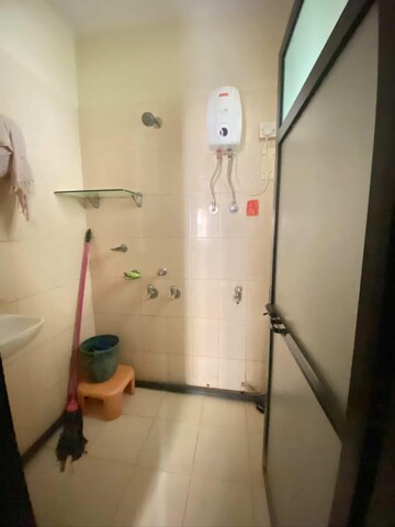 Bathroom in 1 BHK Apartment at Unnathi Woods Phase 1 And 2, Ghodbunder Road – for Rent