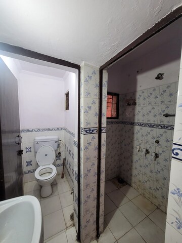 Bathroom in 1 BHK Apartment at RWA GTB Enclave Pocket D, Dilshad Garden – for Rent