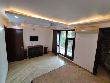 Bedroom in 4 BHK Builder Floor at Freedom Fighters Enclave – for Rent