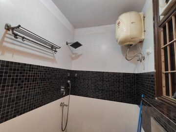 Bathroom in 4 BHK Builder Floor at Freedom Fighters Enclave – for Rent