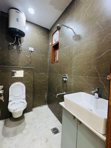Bathroom in 2 BHK Builder Floor at Freedom Fighters Enclave – for Rent