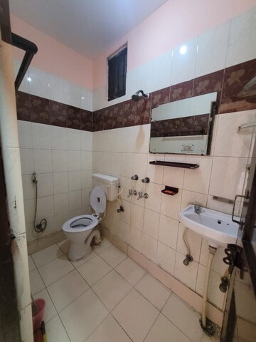 Bathroom in 2 BHK Apartment at RWA Pocket R Dilshad Garden, Dilshad Garden – for Sale