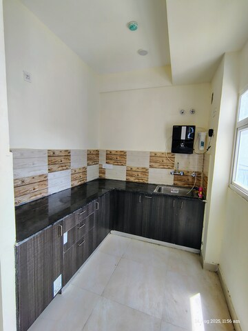 Kitchen in 2 BHK Apartment at NBCC Aspire Enchante, Tech Zone 4 Greater Noida – for Rent