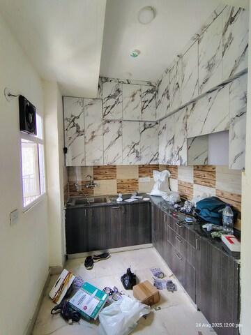 Kitchen in 2 BHK Apartment at Amrapali Enchante, Tech Zone 4 Greater Noida – for Rent