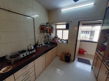 Kitchen in 1 BHK Apartment at Riddhi Gardens CHS, Malad East – for Rent
