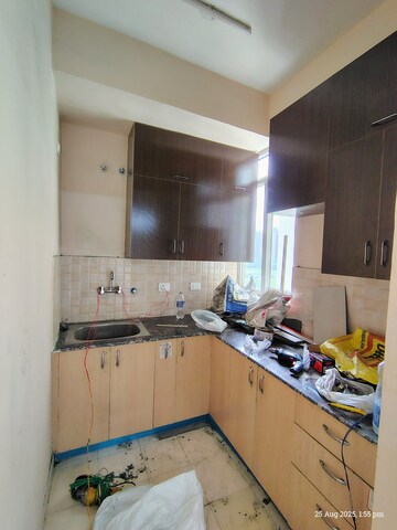 Kitchen in 2 BHK Apartment at Amrapali Dream Valley, Tech Zone 4 Greater Noida – for Rent
