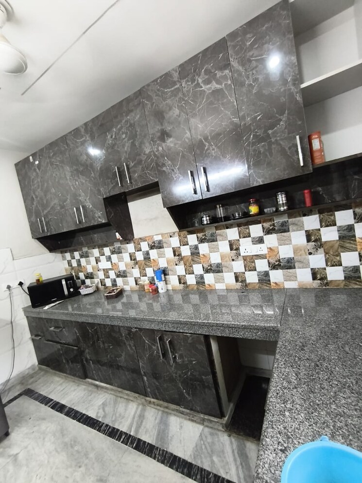 Kitchen, vishwas park 4 Bedroom 90 Sq.Yd. Builder Floor In Vishwas Park Delhi 9105018