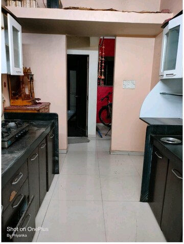 Kitchen in 2 BHK Apartment at VR Bhoomi Acre I Wing, Waghbil – for Rent