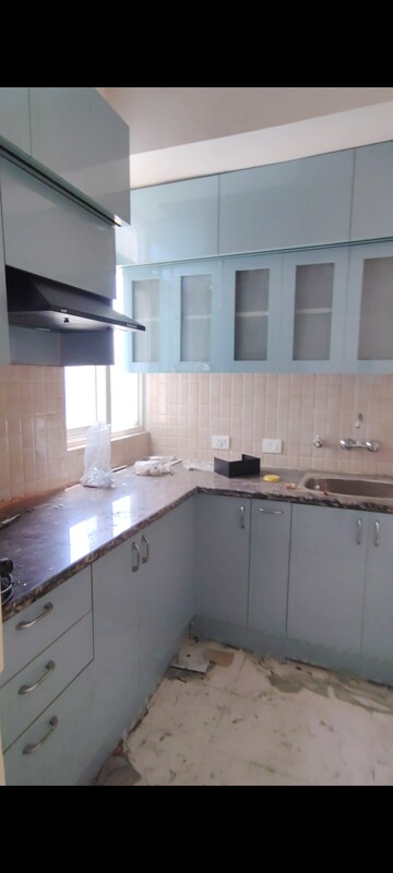 Kitchen in 2 BHK Apartment at Amrapali Dream Valley, Tech Zone 4 Greater Noida – for Rent