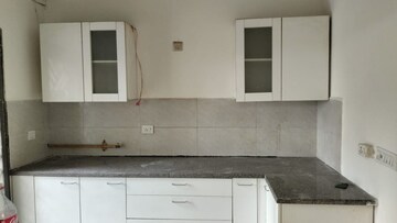 Kitchen in 3 BHK Builder Floor at Puri Aman Vilas, Sector 89 – for Sale