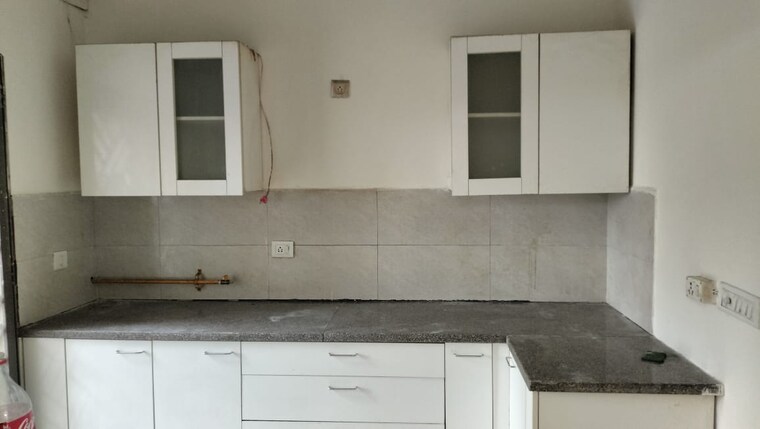 Kitchen, puri-aman-vilas 3 Bedroom 1310 Sq.Ft. Builder Floor In Sector 89 Faridabad 9105151
