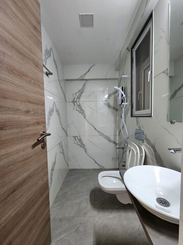 Bathroom in 2.5 BHK Apartment at Kalpataru Aura, Ghatkopar West – for Rent