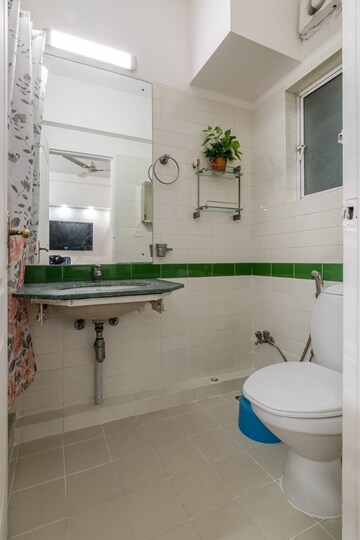 Bathroom in 4 BHK Apartment at DLF The Belvedere Park, Sector 24 – for Rent