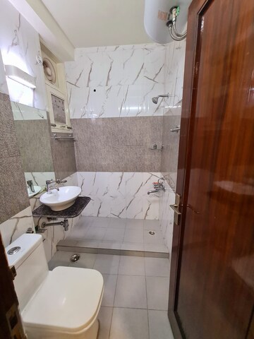 Bathroom in 3 BHK Apartment at Sukhdev Vihar – for Sale