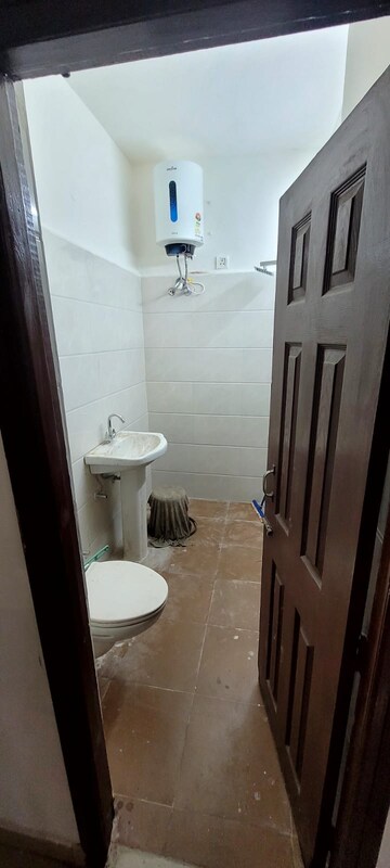 Bathroom in 3 BHK Apartment at Dhakoli – for Rent