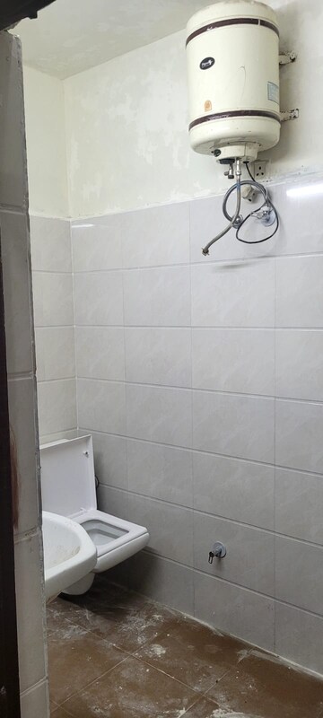 Bathroom in 3 BHK Apartment at Dhakoli – for Rent