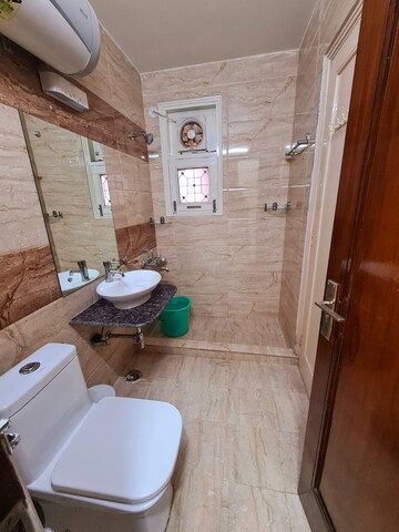 Bathroom in 3 BHK Apartment at Sukhdev Vihar – for Sale