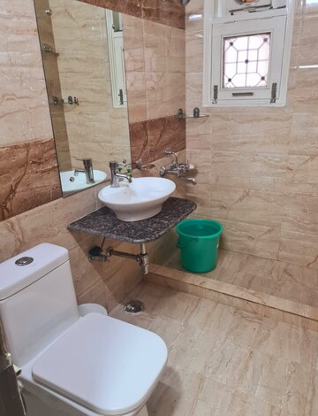Bathroom in 3 BHK Apartment at Sukhdev Vihar – for Sale
