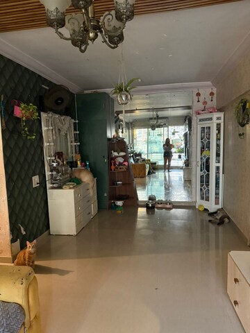 Living Room in 2 BHK Apartment at Ratnagar CHS, Andheri West – for Sale
