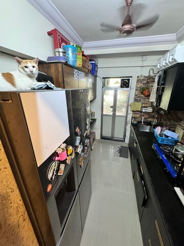Kitchen in 2 BHK Apartment at Ratnagar CHS, Andheri West – for Sale