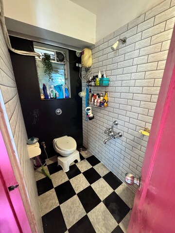 Bathroom in 2 BHK Apartment at Ratnagar CHS, Andheri West – for Sale