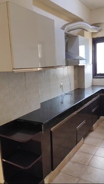 Kitchen in 2.5 BHK Apartment at RPS Savana, Sector 88 – for Rent