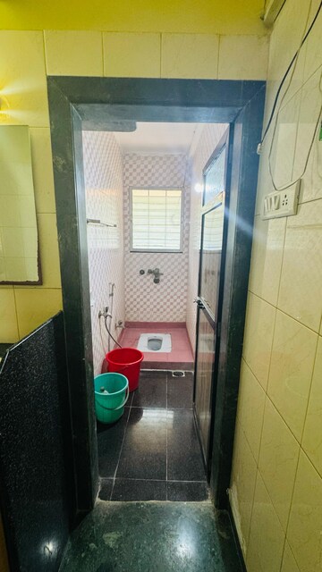 Bathroom in 2 BHK Apartment at New Nikita Apartments, Borivali West – for Rent