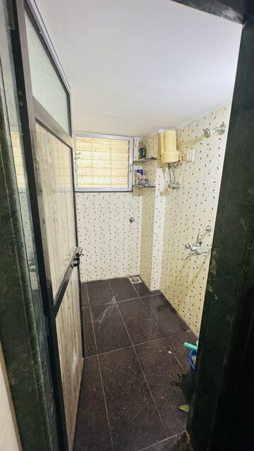 Bathroom in 2 BHK Apartment at New Nikita Apartments, Borivali West – for Rent