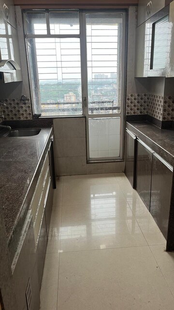 Kitchen in 2 BHK Apartment at Ajmera New Era, Kalyan West – for Sale