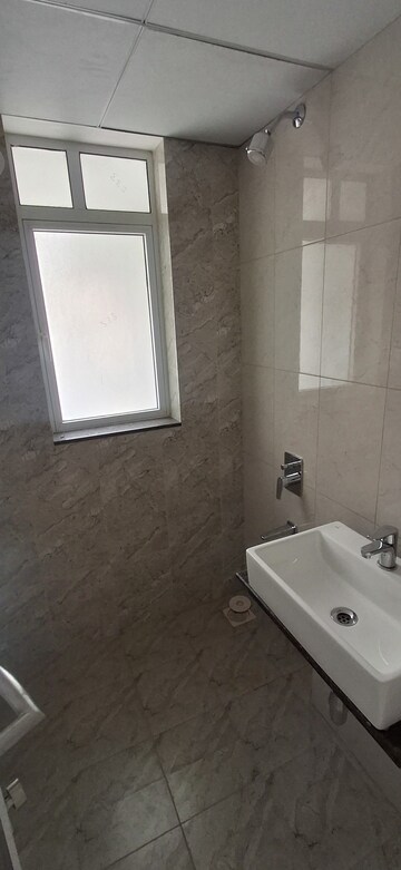 Bathroom in 3 BHK Apartment at Godrej Green Vistas, Mahalunge – for Rent