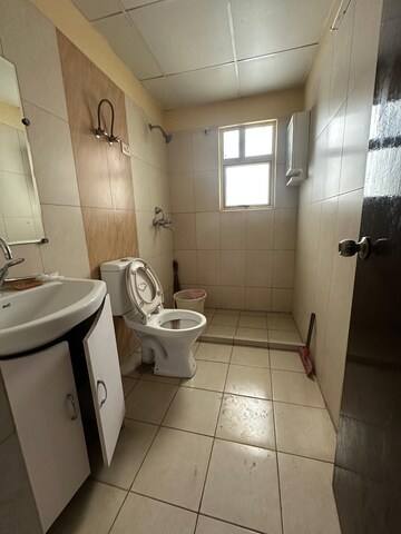 Bathroom in 2 BHK Apartment at Landcraft Golf Links, Pandav Nagar – for Rent
