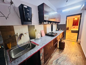 Kitchen in 3 BHK Apartment at Gardenia Glory, Sector 46 – for Rent