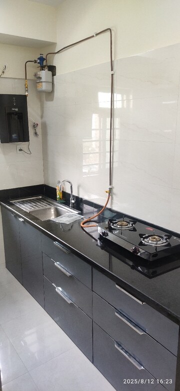 Kitchen in 1 BHK Apartment at Sheth Vasant Oasis, Andheri East – for Rent