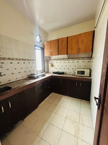 Kitchen in 2 BHK Builder Floor at Freedom Fighters Enclave – for Rent