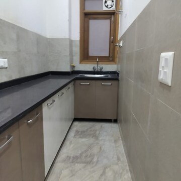 Kitchen in 2 BHK Builder Floor at Palm Residency Chhatarpur, Rajpur Khurd Extension – for Rent