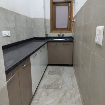 Kitchen in 2 BHK Builder Floor at Palm Residency Chhatarpur, Rajpur Khurd Extension – for Rent