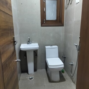 Bathroom in 2 BHK Builder Floor at Palm Residency Chhatarpur, Rajpur Khurd Extension – for Rent