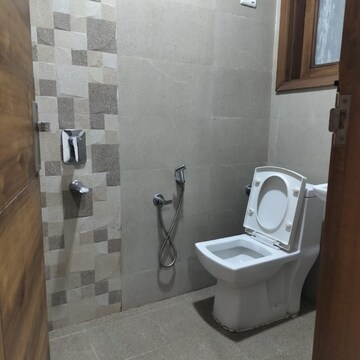 Bathroom in 2 BHK Builder Floor at Palm Residency Chhatarpur, Rajpur Khurd Extension – for Rent